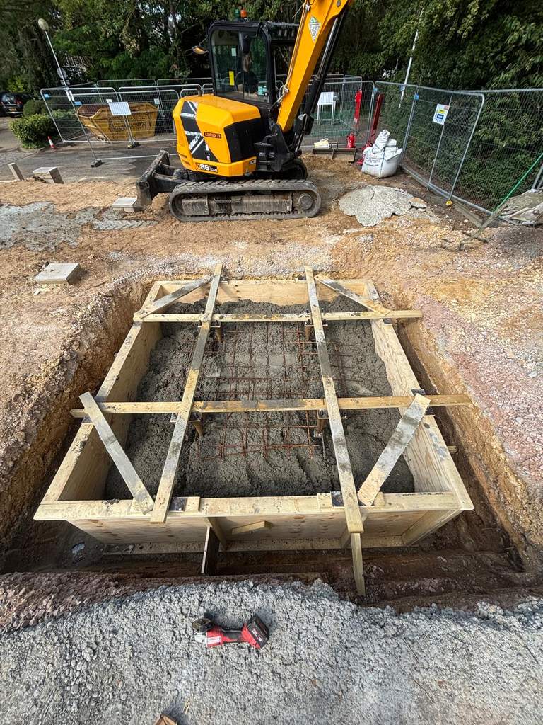 Timber formwork and rebar base for cast concrete foundation