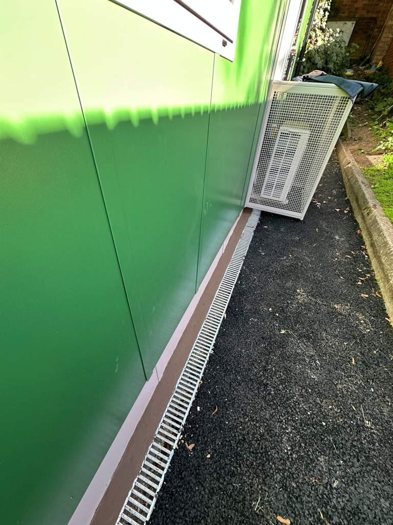 Completed perimeter drainage and tarmac path along a new modular school building Ebbsfleet Kent — M.Smithson LTD