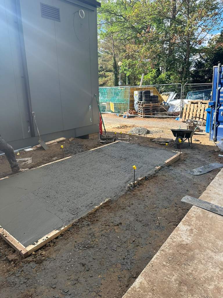 New concrete path cast around the steel tower base Ebbsfleet
