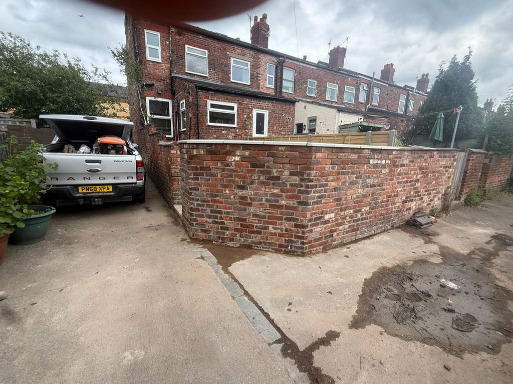 Finished reclaimed-brick boundary wall with new coping at Glanvor Road Stockport