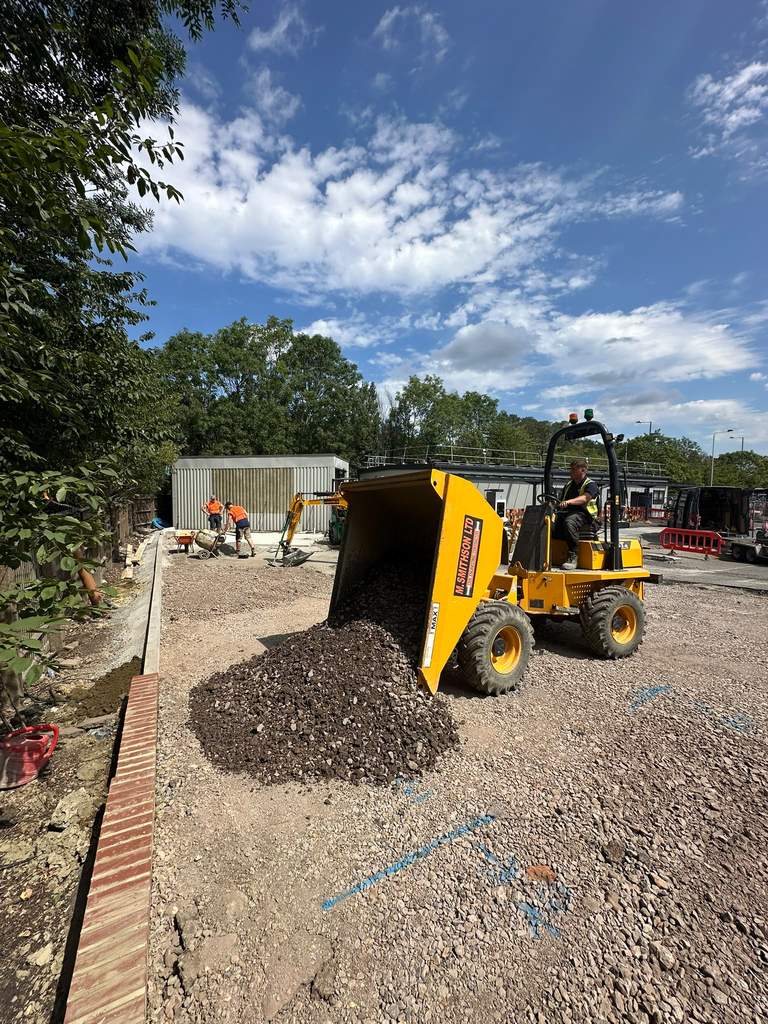 M.Smithson LTD dumper tipping aggregate on groundworks site at Heston West London