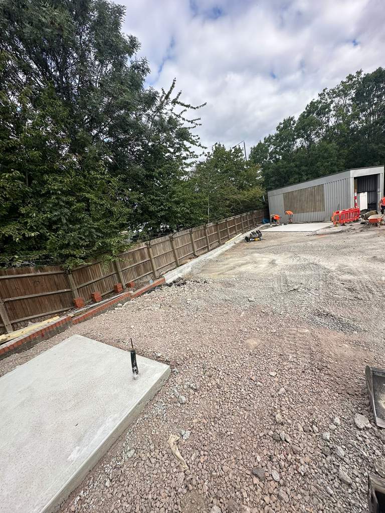 New brick edging and graded sub-base nearing completion
