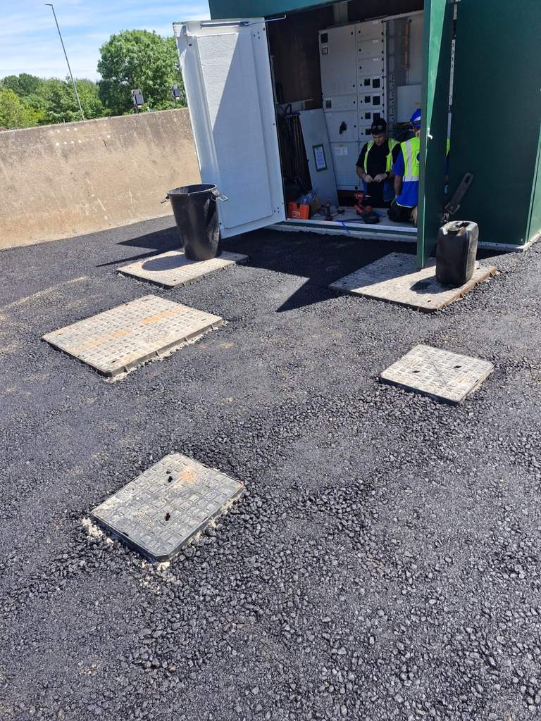 Fresh tarmac surfacing with bedded access covers at Shepshed Leicestershire