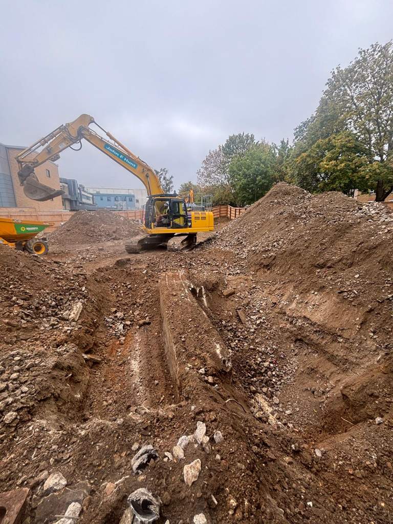 Crusher and excavator producing recycled aggregate Watford